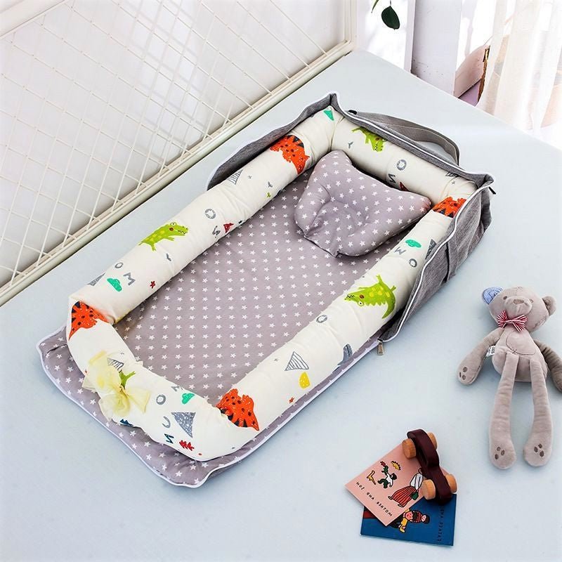 Matelas à langer dinosaure portable