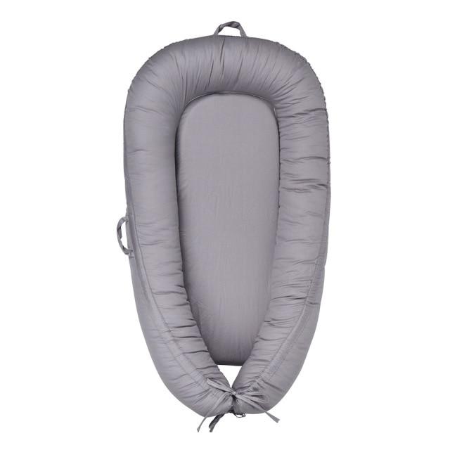 Réducteur de lit bébé | Gris